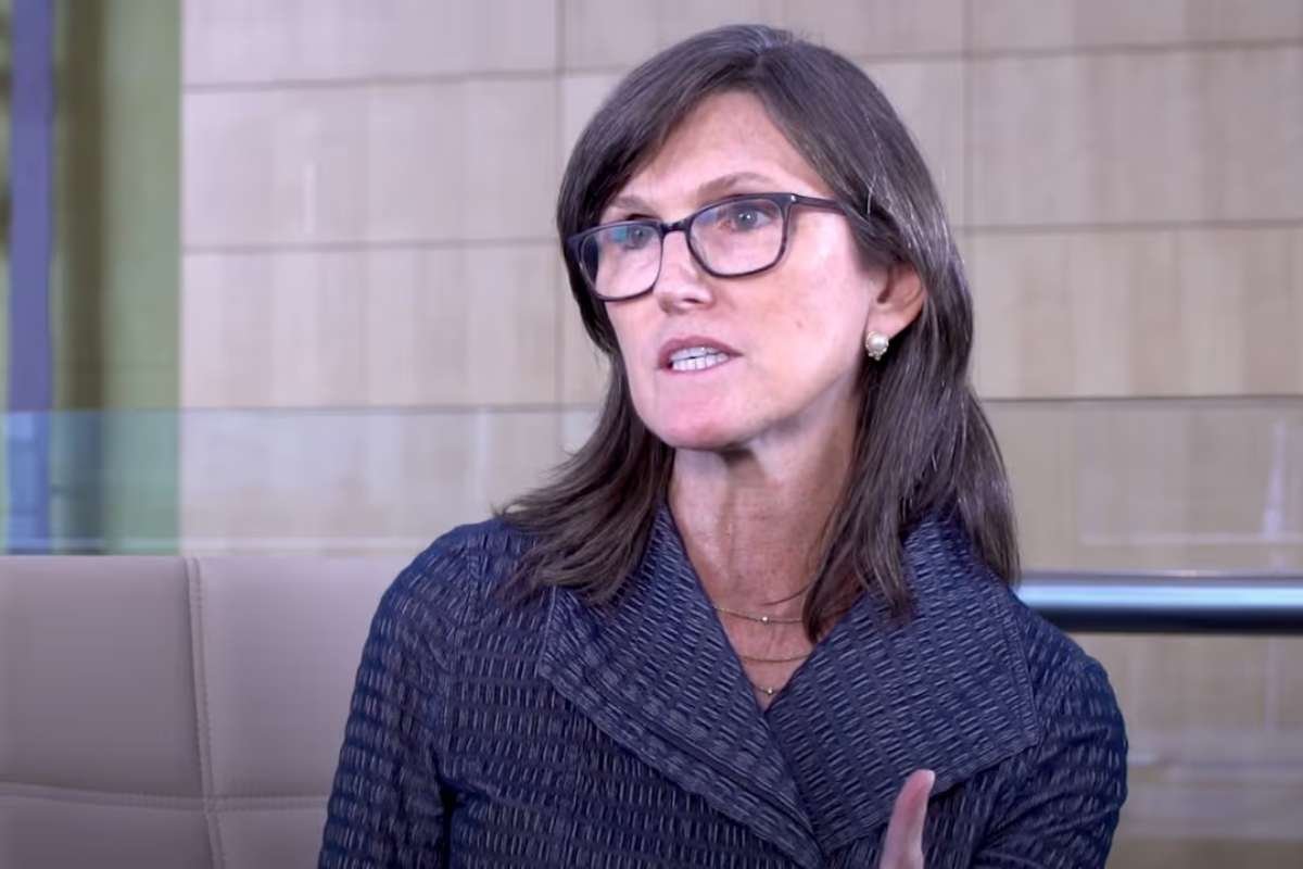 Bitcoin Slides Below $77,000 as Cathie Wood Reaffirms $1.2M Forecast 